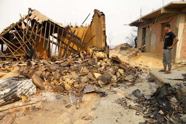 Fires in Jijel and Bedjaia: A general view of the burned houses, cars, and animals in the village of Nador, in the Jijel Mountains east of Algiers, in Algeria on August 27, 2026. The Algerian Ministry of the Interior announced that at least 12 people have died and 54 others have been injured in multiple forest fires across the country. Photo by Billel Bensalem, APP, Jijel, Algeria Copyright: xAlgÃ riexPressexPhotosxBillelxBensalemx xAPPx _MG_9026