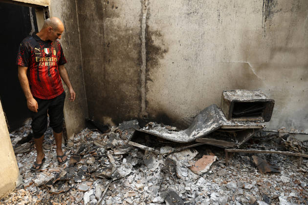 Fires in Jijel and Bedjaia: A general view of the burned-out houses, cars, and animals in the village of Nador, in the Jijel mountains east of Algiers, in Algeria on August 27, 2026. The Algerian Ministry of the Interior announced that at least 12 people have died and 54 others have been injured in multiple forest fires across the country. Photo by Billel Bensalem, APP, Jijel, Algeria Copyright: xAlgÃ riexPressexPhotosxBillelxBensalemx xAPPx _MG_9034