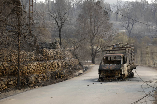 Fires in Jijel and Bedjaia: A general view of the burned-out houses, cars, and animals in the village of Nador, in the Jijel mountains east of Algiers, in Algeria on August 27, 2026. The Algerian Ministry of the Interior announced that at least 12 people have died and 54 others have been injured in multiple forest fires across the country. Photo by Billel Bensalem, APP, Jijel, Algeria Copyright: xAlgÃ riexPressexPhotosxBillelxBensalemx xAPPx _MG_9052