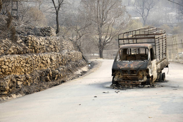 Fires in Jijel and Bedjaia: A general view of the burned-out houses, cars, and animals in the village of Nador, in the Jijel mountains east of Algiers, in Algeria on August 27, 2026. The Algerian Ministry of the Interior announced that at least 12 people have died and 54 others have been injured in multiple forest fires across the country. Photo by Billel Bensalem, APP, Jijel, Algeria Copyright: xAlgÃ riexPressexPhotosxBillelxBensalemx xAPPx _MG_9053