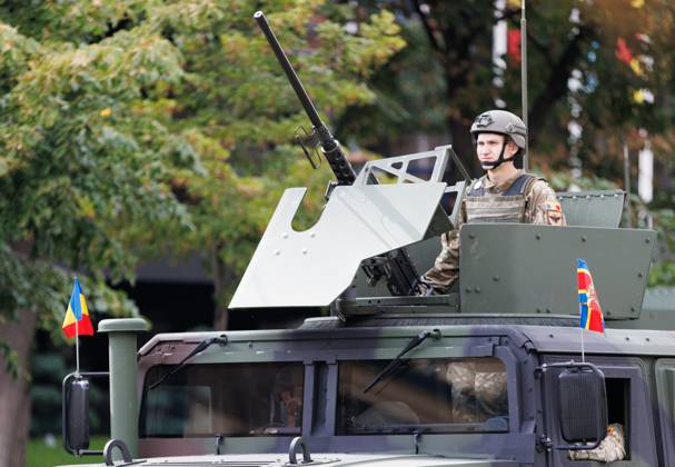 Moldova Independence Day 9230207 27.08.2026 A Moldovan serviceman rides atop a High Mobility Multipurpose Wheeled Vehicle (HMMWV or Humvee) during a military parade during Moldova s Independence Day celebrations in Chisinau, Moldova. Sputnik Chisinau Moldova  Copyright: xx