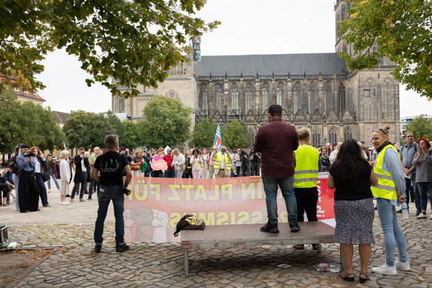 Migra-Streik rally against racism and social exclusion in Germany s Magdeburg MAGDEBURG, GERMANY - AUGUST 27: Business owners, organizers and supporters take part in a rally against racism and social exclusion outside the Saxony-Anhalt state parliament at Domplatz in Magdeburg, Germany, on August 27, 2026. The rally was held as part of the Migra-Streik, during which participating migrant-run businesses across Magdeburg voluntarily closed from 10 a.m. to 3 p.m. to call for solidarity and the protection of a free and democratic society, ahead of Saxony-Anhalt s state election on September 6. Somaya Abdelrahman Anadolu Magdeburg Germany. Editorial use only. Please get in touch for any other usage.  Copyright: x2026xAnadoluxSomayaxAbdelrahmanx