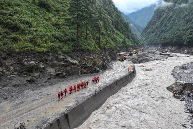 SHIGATSE, CHINA - AUGUST 28: Rescue workers from the fire and rescue department conduct search operations at a disaster site on August 28, 2026 in Shigatse, Xizang Autonomous Region of China. A landslide occurred on the Nepal side of the border on August 26, causing casualties and missing persons near the Gyirong Port in Gyirong County; traffic authorities have cleared approximately 800 meters of the affected G216 highway section as of August 27.  Copyright: xChinaxNewsxServicex 111662595481