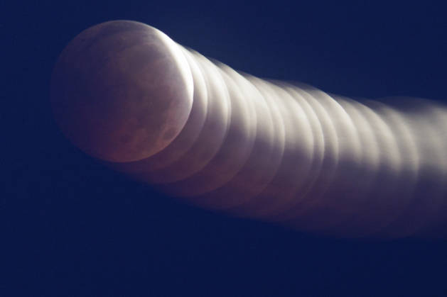 Partial Lunar Eclipse Seen Over Southern France. France - Sete, 28.08.2026 A long time exposure with intentional movement as the Moon appears reddish during a partial lunar eclipse this Friday morning over Sete in southern France. Occitania