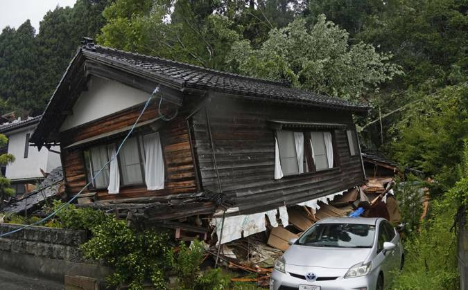 Torrential rain in central Japan Photo taken Aug. 27, 2026, shows a collapsed house in Himi in Toyama Prefecture, central Japan, following torrential rain.  A14AA0005626708P
