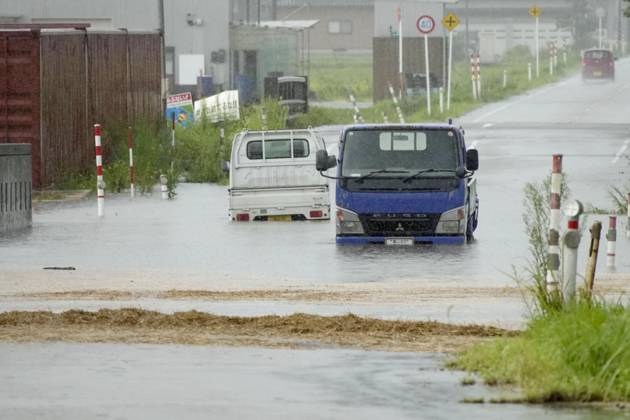 Torrential rain in central Japan Photo shows submerged vehicles on a road in Himi in Toyama Prefecture, central Japan, on Aug. 28, 2026, following torrential rain.  A14AA0005626744P