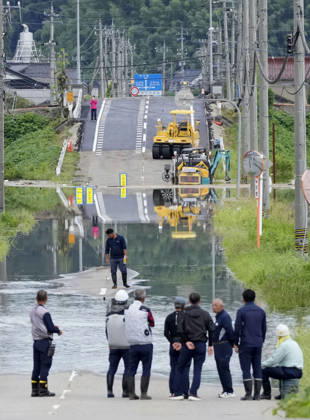 Torrential rain in central Japan A submerged road is pictured in Himi in Toyama Prefecture, central Japan, on Aug. 28, 2026, following torrential rain.  A14AA0005626746P