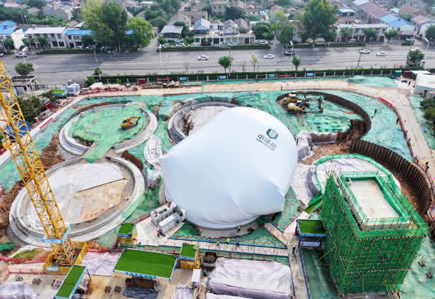 HUAIBEI, CHINA - AUGUST 28: Workers conduct inflation operations for the first air dome warehouse at the construction site of the Central Reserve Grain Huaibei Direct Depot project on August 28, 2026 in Huaibei, Anhui Province of China. The project is described as the largest air dome grain storage complex in the country.  Copyright: xVCGx 111662593571