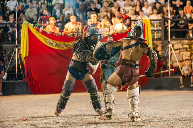 Gladiator fights in Pula, Croatia Members of gladiator school Spectacvla Gladiatoria dressed as Roman gladiators perform a staged combat demonstration during the event Spectacvla Antiqva at the Arena of Pula on August 27, 2026. in Pula, Croatia.  SreckoxNiketic PIXSELL