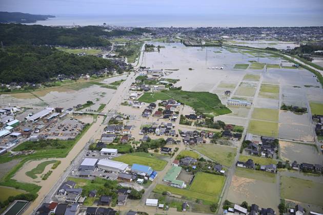 Torrential rain in central Japan Photo taken from a Kyodo News helicopter on Aug. 28, 2026, shows a submerged area in Himi in Toyama Prefecture, central Japan, following torrential rain.  A14AA0005626751P