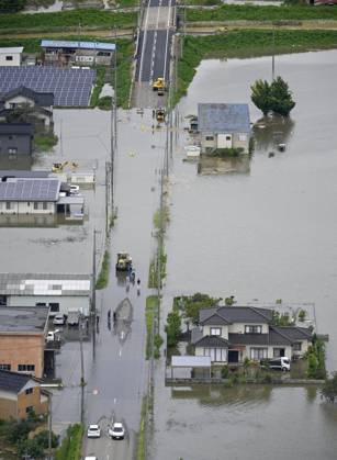 Torrential rain in central Japan Photo taken from a Kyodo News helicopter on Aug. 28, 2026, shows a submerged area in Himi in Toyama Prefecture, central Japan, following torrential rain.  A14AA0005626752P