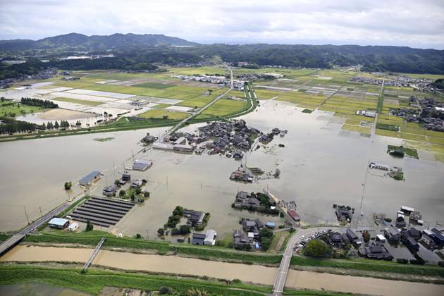 Torrential rain in central Japan Photo taken from a Kyodo News helicopter on Aug. 28, 2026, shows a submerged area in Himi in Toyama Prefecture, central Japan, following torrential rain.  A14AA0005626753P