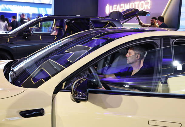 (260828) -- SAO PAULO, Aug. 28, 2026 -- A visitor sits in an electric vehicle of Chinese automaker Leapmotor at the auto edition of the Festival Interlagos 2026 in Sao Paulo, Brazil, Aug. 27, 2026. The four-day auto edition of the Festival Interlagos 2026 kicked off on Thursday at the Autodromo Jose Carlos Pace in Sao Paulo. Chinese carmakers showcase their new models of new energy vehicles at the event. ) BRAZIL-SAO PAULO-FESTIVAL INTERLAGOS-AUTO EDITION-CHINESE AUTOMAKERS JinxHaoyuan 