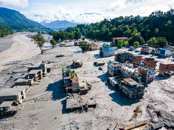 August 28, 2026, Nuwakot, Bagmati, Nepal: NUWAKOT, NEPAL †AUGUST 28, 2026: An aerial view shows the aftermath of severe flooding along the Bhotekoshi River in Nuwakot, Nepal. The flooding affected low-lying areas and settlements near the riverbanks, causing widespread damage to homes, roads, bridges, a hydropower station and other infrastructure. Several people remain missing as authorities continue to assess the extent of the disaster. Rescue teams and security personnel are conducting search and rescue operations in the affected areas. Nuwakot Nepal - ZUMAq101 20260828_zna_q101_125 Copyright: xAmbirxTolangx