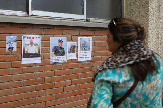 Rasuwa Floods Leave Hundreds Missing As Search For Victims Continues A family member looks at photographs of people missing after floods in Rasuwa, displayed at Tribhuvan University Teaching Hospital in Kathmandu, Nepal, on August 28, 2026. Families have gathered at the hospital seeking information about their missing loved ones following the floods and landslides. Kathmandu Nepal  Copyright: xSubaasxShresthax originalFilename: shrestha-notitle260828_npKIn.jpg