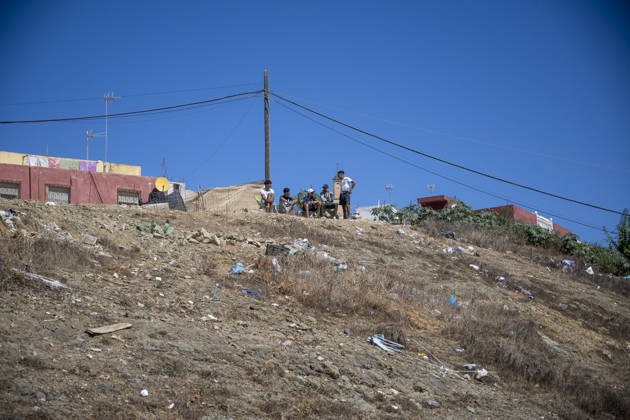 Daily Life of Migrants in the El Tarajal Industrial Park: Several people in the El Tarajal Industrial Park, on August 28, 2026, in Ceuta, Spain. Ceuta has announced plans to renovate the six industrial warehouses in the El Tarajal industrial park in order to transform them into a reception center. The project includes the installation of restrooms, kitchens, bedrooms, and other facilities. Depending on the condition of each warehouse, the project will also require the replacement of roofs, painting, and other repairs. AUGUST 28, 2026 MIGRATION CRISIS Ceuta, Spain Copyright: xMarcosxMorenox 7736144