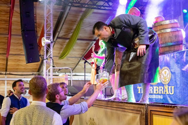 Augsburg, Bavaria, Germany August 28, 2026: Opening of the Plärrer in Augsburg. After tapping the first keg at the Herbstplärrer, Augsburg™s mayor, Dr. Florian Freund (SPD), traditionally hands out free beer to visitors in the festival tent, thereby kicking off the evening™s festivities.