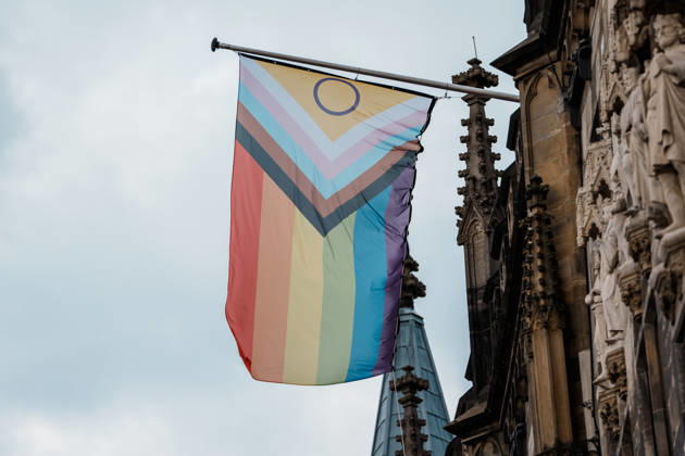 Germany, Aachen CSD, Aachen Pride 2026, Christopher Street Day, Parade, Equality, Anti-queer sentiment, Trans rights, Equal rights, Pride flag flying at Aachen City Hall on the Markt Copyright: xThiemoxRudolphx