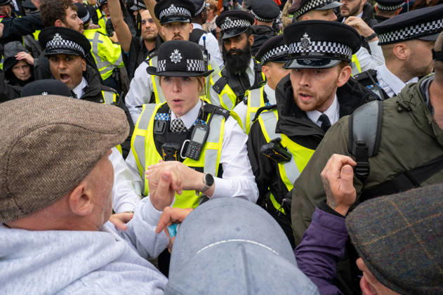 August 29, 2026, London, Westminster, United Kingdom: UKIP supporters and police officers confront one another during the No to Sharia Law march and rally in central London. UKIP leader Nick Tenconi led supporters on a march and rally through central London calling for an end to Sharia law in Great Britain. The demonstration, organized under the banner No to Sharia Law, was met by a counter-protest. Tensions rose at the start of the march, with counter-protesters pushing against police officers as officers attempted to keep the opposing groups apart. The Metropolitan Police had imposed conditions on both demonstrations to prevent serious disorder. London United Kingdom  - ZUMAs197 20260829_aaa_s197_178 Copyright: xJamesxWilloughbyx