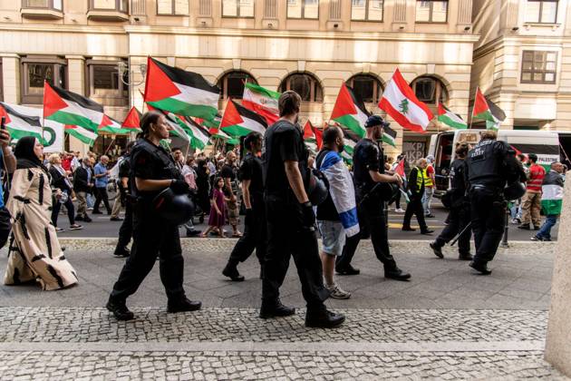 August 29, 2026, Berlin, Germany: BERLIN, GERMANY, AUGUST 29, 2026: Hundreds of people take part in a pro-Palestinian demonstration in central Berlin, criticizing the German government s policy toward Israel and its position on the war in Gaza. Police in riot gear accompany the march, which is led by members of the Palestinian diaspora. The demonstration concludes near Berlin City Hall, where participants display an installation commemorating children killed in Gaza, including a vehicle presented in reference to Hind Rajab, a Palestinian girl killed in Gaza in 2024. Berlin Germany - ZUMAq101 20260829_zna_q101_180 Copyright: xAndro SxTrujillox