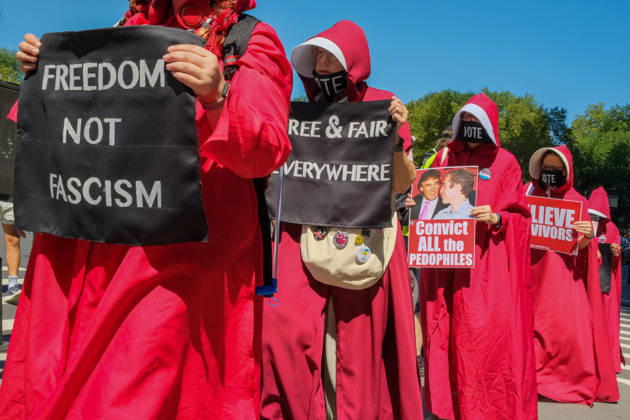 August 29, 2026, New York, New York, USA: Along Central Park the National Handmaiden Army and their visual imagery in NYC silently protesting.Donald Trump, the lack of womens rights, government policies, reproductive rights, getting out the Vote,.gender discrimination and body autonomy. They are striking symbols of political defiance and solidarity. New York USA  - ZUMAh156 20260829_znp_h156_004 Copyright: xMiloxHessx