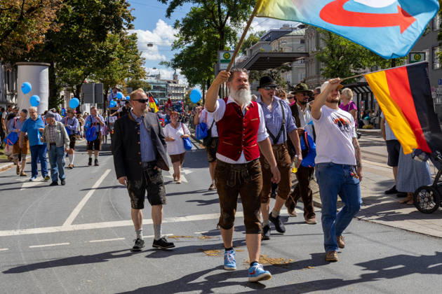 Augsburg, Bavaria, Germany - August 29, 2026: Traditional Plärrer parade in Augsburg. Members of the AfD (Alternative for Germany) take part in the traditional Plärrer parade through Augsburg, carrying party banners and German flags, and march through the city alongside other groups