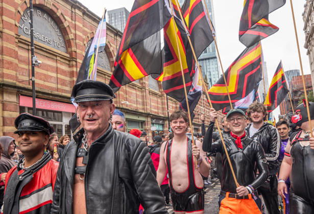 August 29, 2026, Manchester, United Kingdom: Revelers march on the street during the pride parade. Revelers refused to let a heavy downpour dampen their spirits as the annual parade makes its way through the city centre. Despite the torrential rain, the LGBTQ+ community and supporters partied anyway, filling the streets with vibrant colour, music, and joy. The festival has been officially renamed Manchester Village Pride this year, marking a new community-led chapter after the voluntary liquidation and financial collapse of the former organizing company last autumn. Taking part in the celebrations, the newly elected Mayor of Greater Manchester, Bev Craig, actively engaged with parade participants and cheering crowds along the route through - ZUMAs197 20260829_aaa_s197_374 Copyright: xGaryxRobertsx
