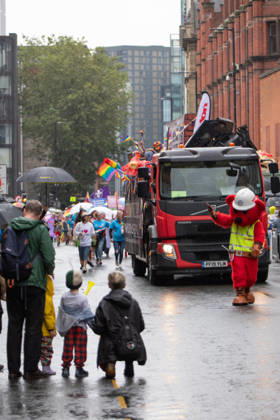 August 29, 2026, Manchester, United Kingdom: A family await the fireman pride group during the pride parade. Revelers refused to let a heavy downpour dampen their spirits as the annual parade makes its way through the city centre. Despite the torrential rain, the LGBTQ+ community and supporters partied anyway, filling the streets with vibrant colour, music, and joy. The festival has been officially renamed Manchester Village Pride this year, marking a new community-led chapter after the voluntary liquidation and financial collapse of the former organizing company last autumn. Taking part in the celebrations, the newly elected Mayor of Greater Manchester, Bev Craig, actively engaged with parade participants and cheering crowds along the rout - ZUMAs197 20260829_aaa_s197_376 Copyright: xGaryxRobertsx