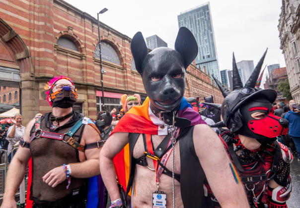 August 29, 2026, Manchester, United Kingdom: Human pups join the parade. Revelers refused to let a heavy downpour dampen their spirits as the annual parade makes its way through the city centre. Despite the torrential rain, the LGBTQ+ community and supporters partied anyway, filling the streets with vibrant colour, music, and joy. The festival has been officially renamed Manchester Village Pride this year, marking a new community-led chapter after the voluntary liquidation and financial collapse of the former organizing company last autumn. Taking part in the celebrations, the newly elected Mayor of Greater Manchester, Bev Craig, actively engaged with parade participants and cheering crowds along the route through central Manchester towards - ZUMAs197 20260829_aaa_s197_381 Copyright: xGaryxRobertsx