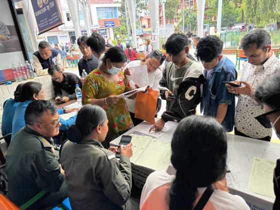 August 30, 2026, Kathmandu, Nepal: Relatives search for missing family members with police personnel, as photographs of missing people are displayed outside the hospital, four days after devastating flash floods struck areas near the Nepal-China border at Tribhuvan University Teaching Hospital in Maharajgunj, Kathmandu,Nepal on August 30, 2026. According to authorities, 734 people had died and 2,498 remained missing as morning of Aug. 30, 2026, following devastating flash floods that struck areas near the Nepal-China border on Aug. 26. Kathmandu Nepal - ZUMAs233 20260830_zap_s233_008 Copyright: xSunilxSharmax