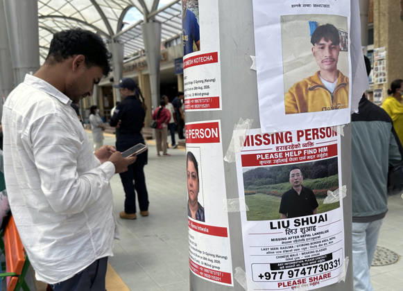 August 30, 2026, Kathmandu, Nepal: A person search for missing family members as photographs of missing people are displayed outside the hospital, four days after devastating flash floods struck areas near the Nepal-China border at Tribhuvan University Teaching Hospital in Maharajgunj, Kathmandu,Nepal on August 30, 2026. According to authorities, 734 people had died and 2,498 remained missing as morning of Aug. 30, 2026, following devastating flash floods that struck areas near the Nepal-China border on Aug. 26. Kathmandu Nepal - ZUMAs233 20260830_zap_s233_009 Copyright: xSunilxSharmax