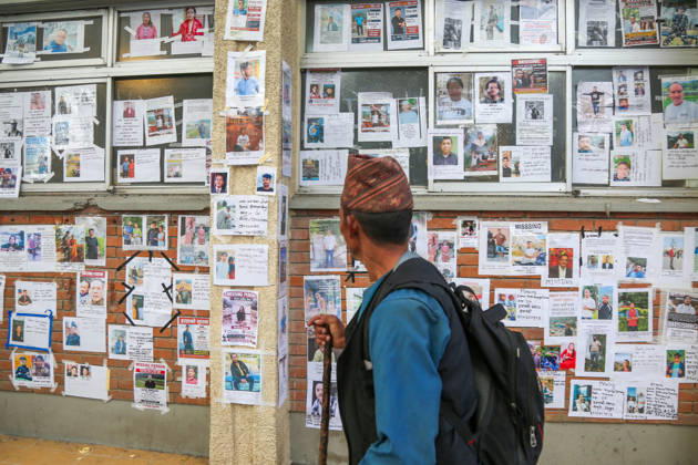 Families Search For Loved Ones After Nepal Floods - Kathmandu People look at a wall displaying photographs of people reported missing outside a hospital in Kathmandu, Nepal on August 30, 2026. Photo by Sunil Pradhan ABACAPRESS.COM Kathmandu Bagmati Nepal  Copyright: xSuniixPradhan ABACAx