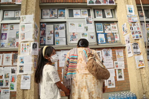 Families Search For Loved Ones After Nepal Floods - Kathmandu People look at a wall displaying photographs of people reported missing outside a hospital in Kathmandu, Nepal on August 30, 2026. Photo by Sunil Pradhan ABACAPRESS.COM Kathmandu Bagmati Nepal  Copyright: xSuniixPradhan ABACAx