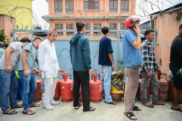 August 31, 2026, Kathmandu, Bagmati, Nepal: Customers wait in long queues to receive liquefied petroleum gas (LPG) cylinders in Kathmandu, Nepal, on August 31, 2026, as the devastating Rasuwa floods add further pressure to an already strained cooking gas distribution system. Nepal had already been facing long queues and difficulties obtaining LPG, with increased demand and distribution problems affecting consumers. The catastrophic flash floods that struck near the Nepal-China border on August 26 swept away homes, vehicles, roads, bridges and other infrastructure, while LPG cylinders were also carried away by the powerful floodwaters. Some people were seen entering the floodwaters and swimming to retrieve the cylinders. The disaster disrupt  - ZUMAs330 20260831_zsp_s330_003 Copyright: xSafalxPrakashxShresthax