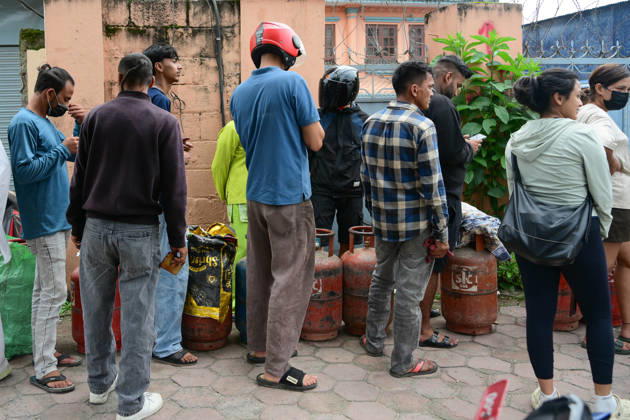 August 31, 2026, Kathmandu, Bagmati, Nepal: Customers wait in long queues to receive liquefied petroleum gas (LPG) cylinders in Kathmandu, Nepal, on August 31, 2026, as the devastating Rasuwa floods add further pressure to an already strained cooking gas distribution system. Nepal had already been facing long queues and difficulties obtaining LPG, with increased demand and distribution problems affecting consumers. The catastrophic flash floods that struck near the Nepal-China border on August 26 swept away homes, vehicles, roads, bridges and other infrastructure, while LPG cylinders were also carried away by the powerful floodwaters. Some people were seen entering the floodwaters and swimming to retrieve the cylinders. The disaster disrupt  - ZUMAs330 20260831_zsp_s330_004 Copyright: xSafalxPrakashxShresthax
