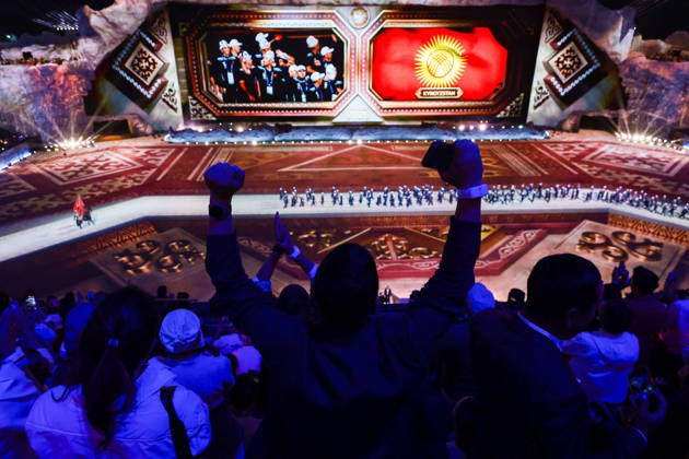 KYRGYZSTAN, BISHKEK - AUGUST 31, 2026: Fans cheer for a team of athletes representing Kyrgyzstan during a ceremony to open the 2026 World Nomad Games at Bishkek Arena. Kirill Kukhmar TASS  96911232