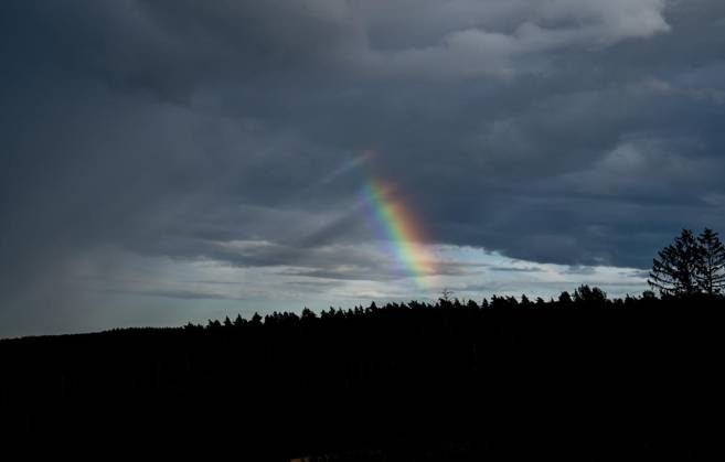 THUNDERSTORM OVER THURINGIA ** FOR EDITORIAL USE ONLY ** p 31 08 2026 Hohenfelden Part of a rainbow is visible in the evening sky over Hohenfelden, Weimarer Land, Germany, Thuringia, Hohenfelden. Copyright SaschaxFromm Copyright: SaschaxFromm doc87emyv9na3attxoluoe ,EDITORIAL USE ONLY Copyright: SaschaxFromm