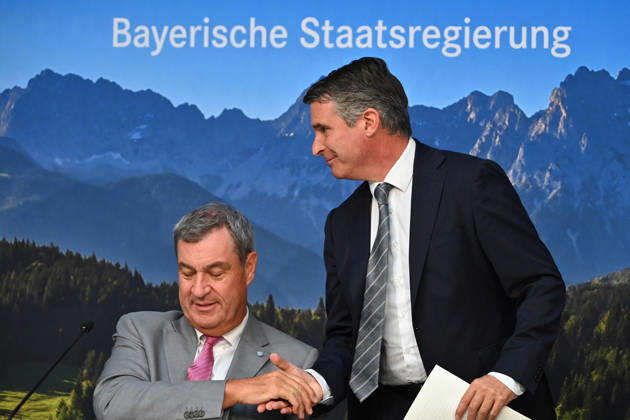 From left: Markus SOEDER, Minister-President of Bavaria and CSU Chairman, and Eric BEISSWENGER, Minister for European Affairs, shaking hands at a press conference held by the Bavarian State Government following a cabinet meeting on September 1, 2026, at the Prinz Carl Palais in Munich