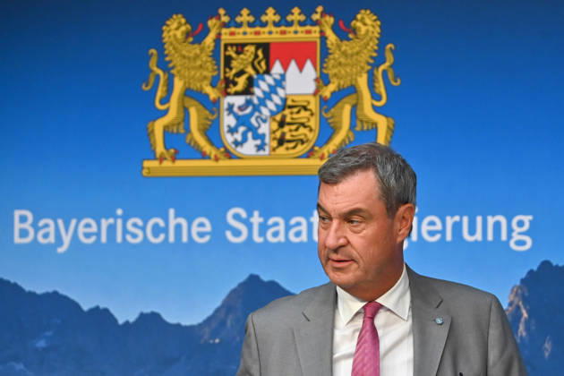 Markus SOEDER, Minister-President of Bavaria and CSU Chairman, and the logo of the Bavarian State Government; single image, cropped close-up, portrait,Portrait: Press conference of the Bavarian State Government following a cabinet meeting on September 1, 2026, at the Prinz Carl Palais in Munich