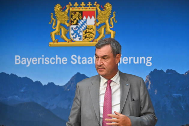 Markus SOEDER, Minister-President of Bavaria and CSU Chairman, and the logo of the Bavarian State Government; single image, cropped close-up, portrait,Portrait: Press conference of the Bavarian State Government following a cabinet meeting on September 1, 2026, at the Prinz Carl Palais in Munich