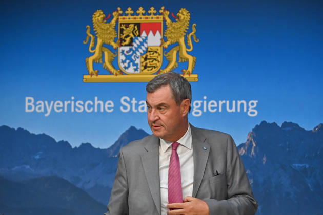 Markus SOEDER, Minister-President of Bavaria and CSU Chairman, and the logo of the Bavarian State Government; single image, cropped close-up, portrait,Portrait: Press conference of the Bavarian State Government following a cabinet meeting on September 1, 2026, at the Prinz Carl Palais in Munich