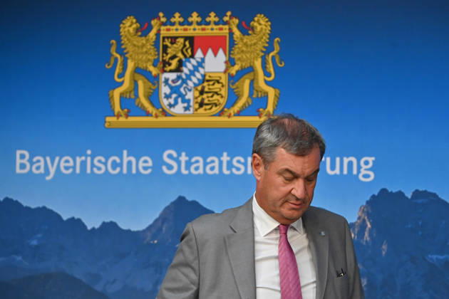 Markus SOEDER, Minister-President of Bavaria and CSU Chairman, and the logo of the Bavarian State Government; single image, cropped close-up, portrait,Portrait: Press conference of the Bavarian State Government following a cabinet meeting on September 1, 2026, at the Prinz Carl Palais in Munich