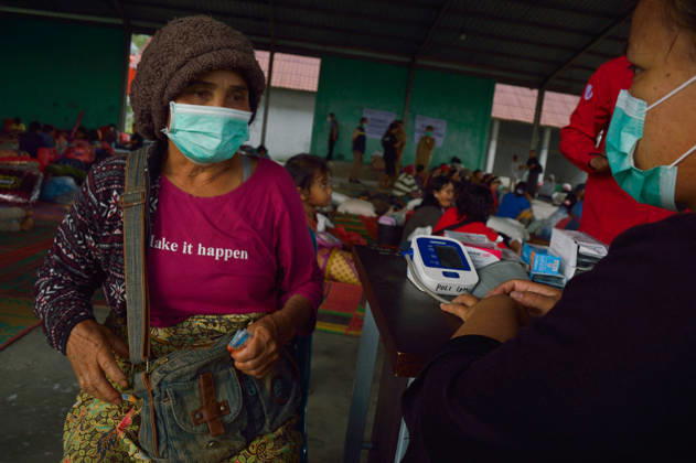 RECORD DATE NOT STATED Residents Evacuate as Mount Sinabung Activity Intensifies - Indonesia Children are seen inside a temporary shelter at a communal hall in Sukatepu Village, Karo Regency, North Sumatra, Indonesia, on September 1, 2026, following renewed volcanic activity from Mount Sinabung. Displaced along with their families, these young evacuees receive basic supplies, face masks, and healthcare support as local authorities manage emergency relief efforts. Having experienced recurring eruptive phases, the communities remain vigilant while disaster management agencies update the dynamic hazard perimeters and evacuation routes across the region. The shelter operation was visited by North Sumatra Governor Bobby Nasution, who inspected the distribution of reli Copyright: xAdityaxSutanta ABACAx