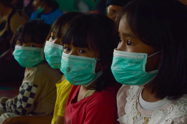 RECORD DATE NOT STATED Residents Evacuate as Mount Sinabung Activity Intensifies - Indonesia Children are seen inside a temporary shelter at a communal hall in Sukatepu Village, Karo Regency, North Sumatra, Indonesia, on September 1, 2026, following renewed volcanic activity from Mount Sinabung. Displaced along with their families, these young evacuees receive basic supplies, face masks, and healthcare support as local authorities manage emergency relief efforts. Having experienced recurring eruptive phases, the communities remain vigilant while disaster management agencies update the dynamic hazard perimeters and evacuation routes across the region. The shelter operation was visited by North Sumatra Governor Bobby Nasution, who inspected the distribution of reli Copyright: xAdityaxSutanta ABACAx