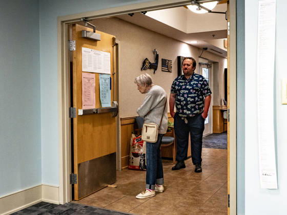 September 1, 2026, South Dennis, Massachusetts, USA: Cape Cod resident GEORGEANNE COREY looks at the sample ballots and she and NICK CHRISTIAN wait for the polls to open at 7 to vote in the Massachusetts primary election. South Dennis USA  - ZUMAd155 20260901_znp_d155_002 Copyright: xSuexDorfmanx