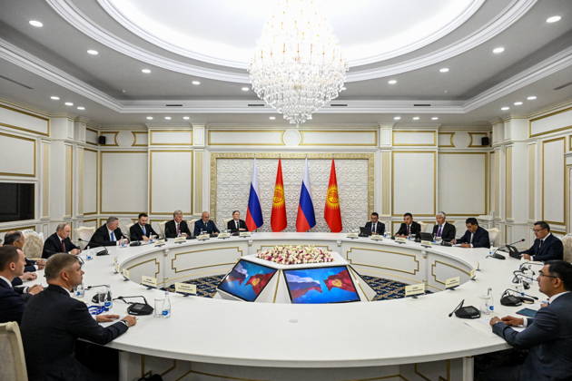 KYRGYZSTAN, BISHKEK - SEPTEMBER 1, 2026: Russia s President Vladimir Putin (L back) and Kyrgyzstan s President Sadyr Japarov (R back) are seen during a meeting at the Ala Archa State Residence on the sidelines of the 2026 Shanghai Cooperation Organisation (SCO) Summit. Kristina Solovyova POOL TASS  96947463