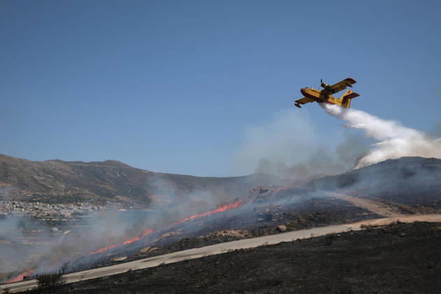 Wildfire near Karystos on Greece s Evia Island EVIA, GREECE - SEPTEMBER 2: A firefighting airplane drops water, as a wildfire burns near Karystos on the island of Evia, Greece, on September 2, 2026 Costas Baltas Anadolu Evia Greece. Editorial use only. Please get in touch for any other usage.  Copyright: x2026xAnadoluxCostasxBaltasx
