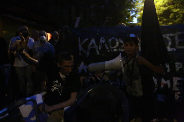 September 2, 2026, Athens, Attica, Greece: Aristotelis Chantzis makes a victory sign as a young boy holds a megaphone and chants slogans at the Prosfygika housing complex in Athens following ChantzisÃ¢â‚¬â ¢ return from Evangelismos Hospital. Athens Greece - ZUMAx103 20260902_zip_x103_009 Copyright: xHarrisxXanthopoulosx