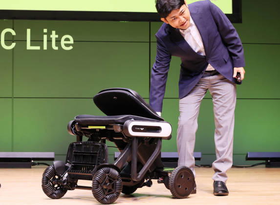 September 3, 2026, Tokyo, Japan - Japanese personal mobility company Whill unveils the new lighweight folding electric wheelchair Whill Model C Lite in Tokyo on Thursday, September 3, 2026. The new mobility weighing 18.6kg body with carbon fiver reinforced plastics parts has omni-directional wheels for front wheels and high performance battery to drive 38.5km of distance. (photo by Yoshio Tsunoda AFLO)  aflo_344739872