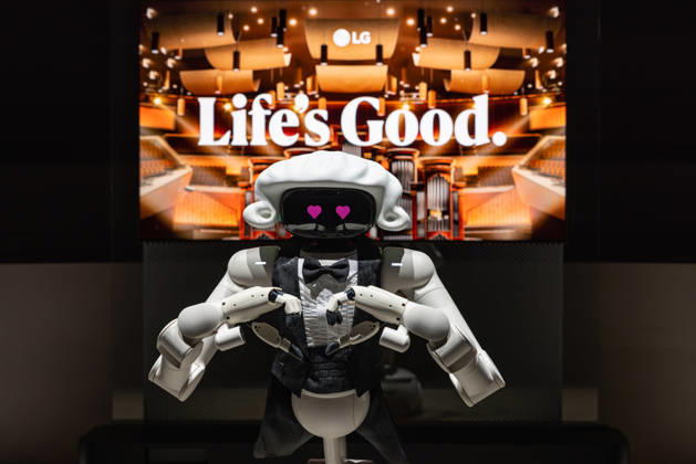 Highlights from IFA 2026 in Berlin, Germany, on September 3, 2026. A robot from LG in Hall 18 puts on a demonstration, forming a heart symbol with its hands in front of a display bearing the slogan Life’s Good.